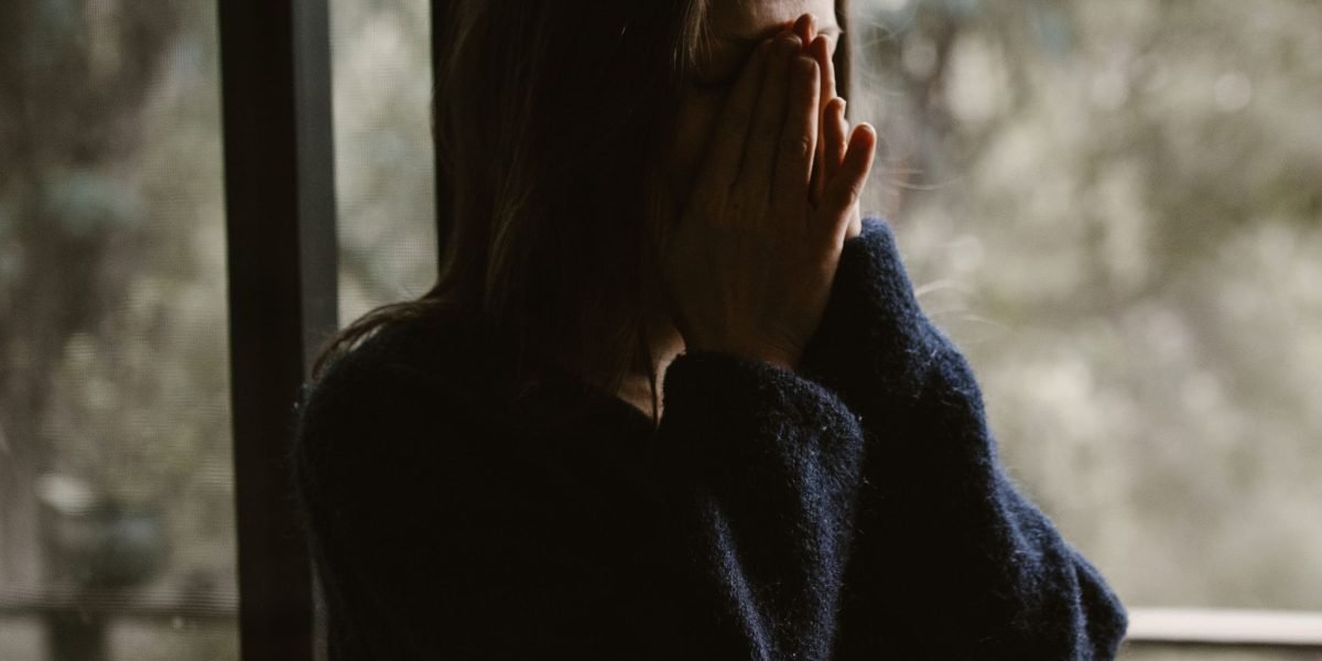 Depicts an individual experiencing the psychological toll of housing instability and the constant worry about finding a safe home.