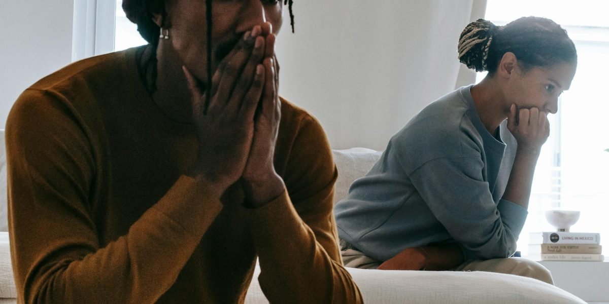 A couple looking distant and sad, illustrating the damaging impact of untreated ASPD on personal relationships.