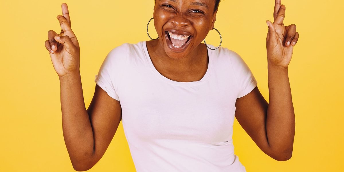 A person feeling empowered and strong, embodying the idea that seeking help is a sign of courage, not weakness.