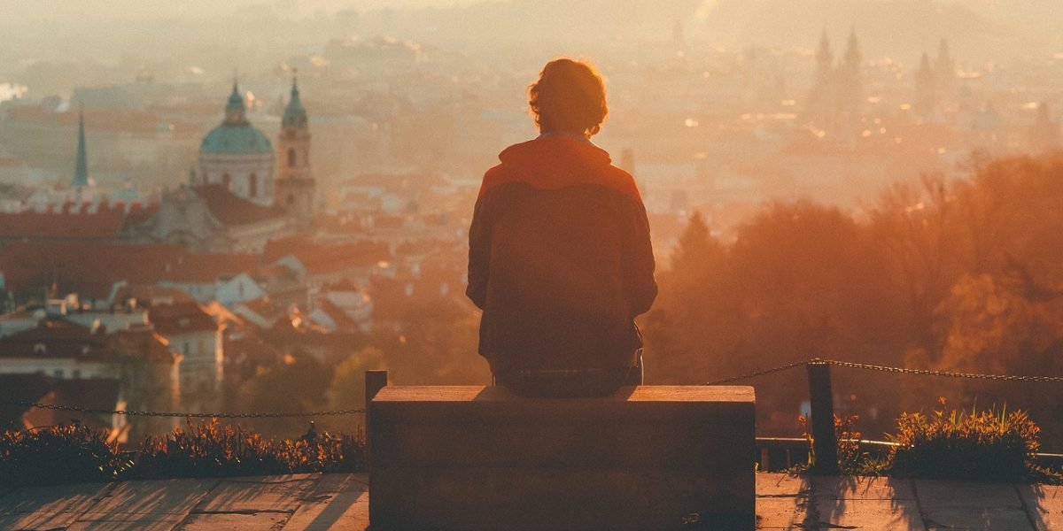 A person in a quiet, thoughtful moment, reflecting on seeking support for their mental well-being.