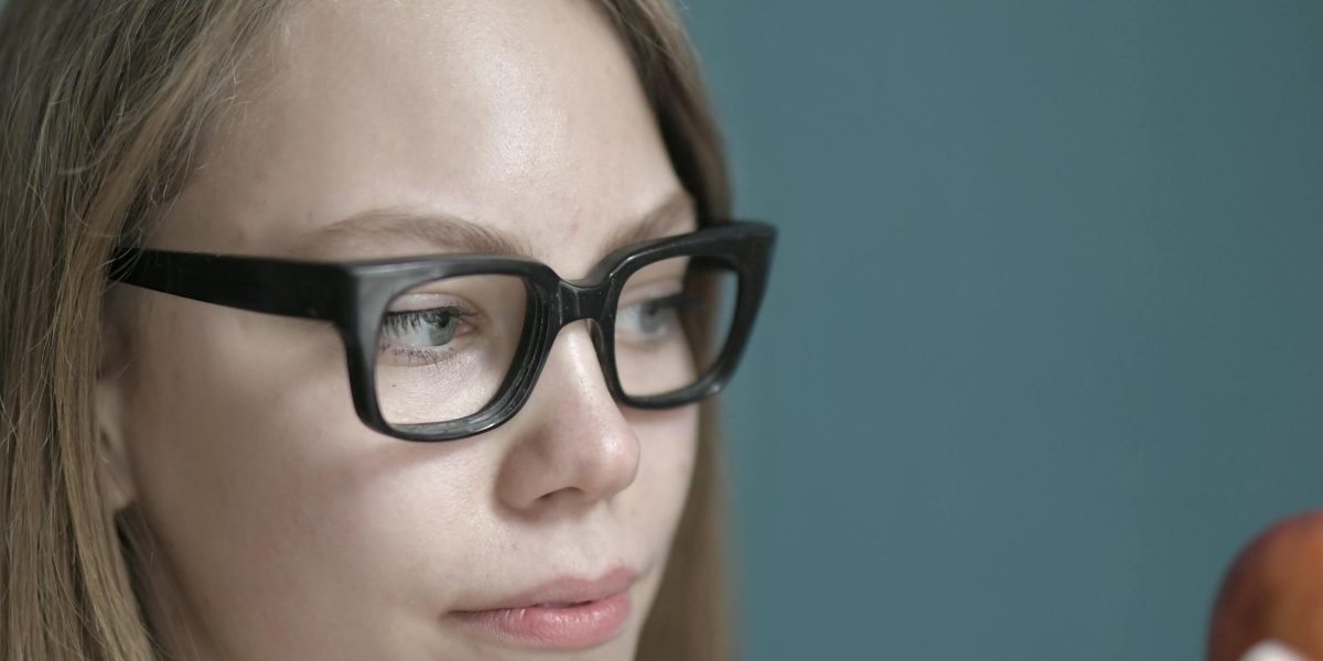 A person thoughtfully considering their options, symbolizing the process of choosing the right counseling approach.