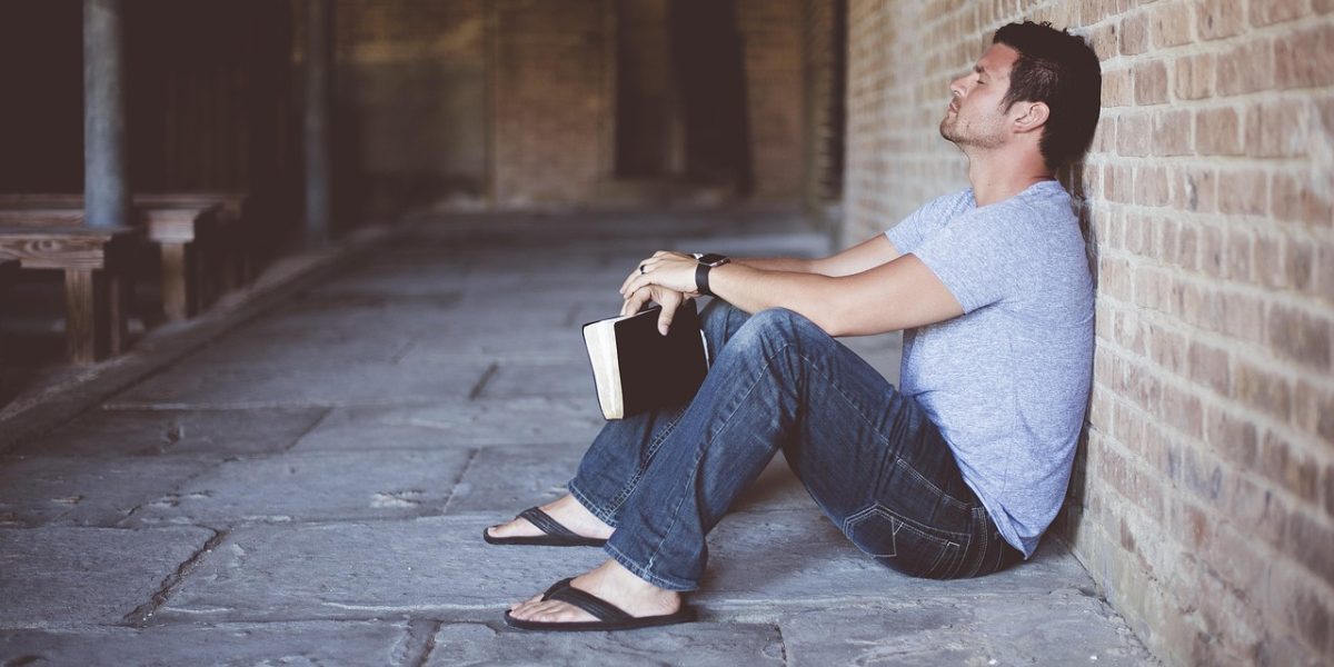 A person engaged in critical thinking, symbolizing the act of understanding complex mental health topics.