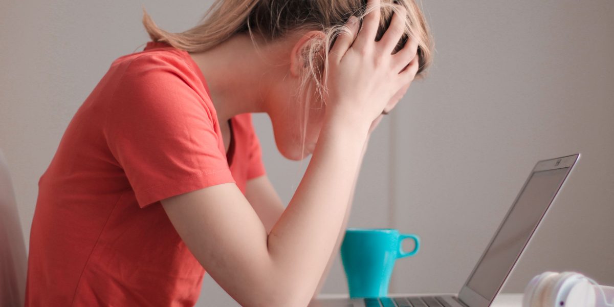 An individual appears overwhelmed or distressed while attempting a routine activity, reflecting the impact of perceptual disorders on daily living.