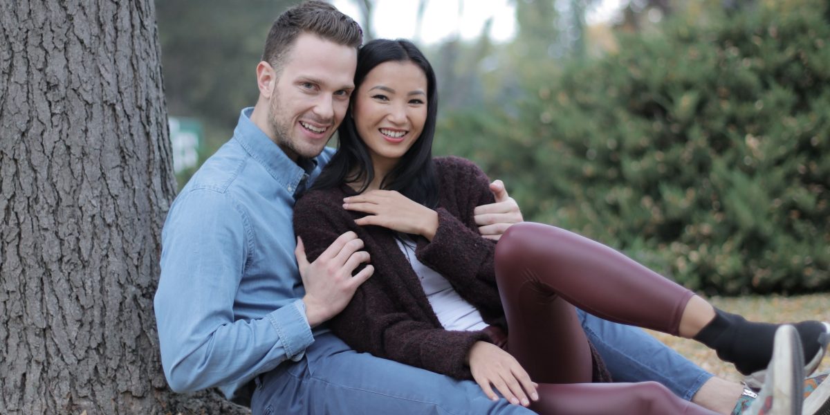 A happy couple walking together, symbolizing successful outcomes and renewed connection after therapy.