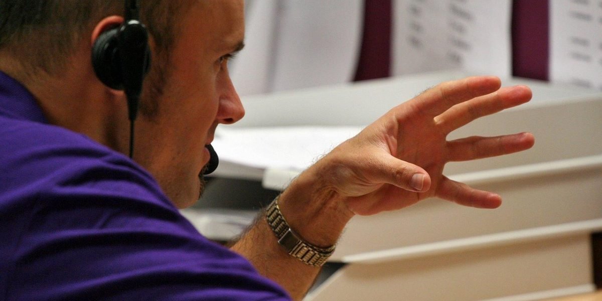 A person engaging in a supportive conversation with a mental health professional.