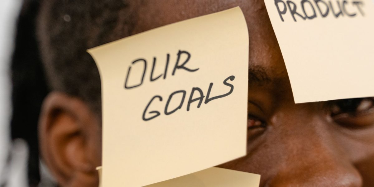 An individual confidently organizing their thoughts and resources, reflecting a structured approach to finding mental health support.